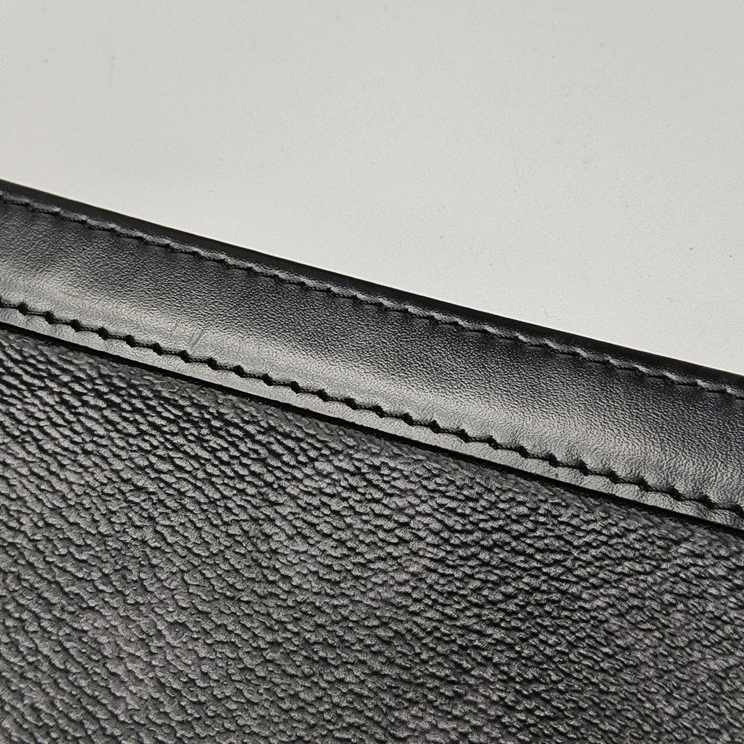 Pochette Voyag MM Monogram Coated Canvas Black