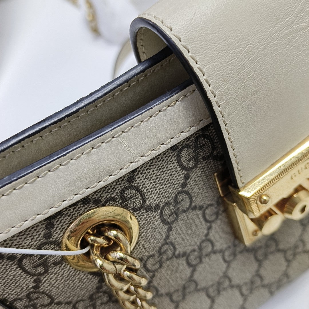 Padlock Small Monogram Coated Canvas Beige