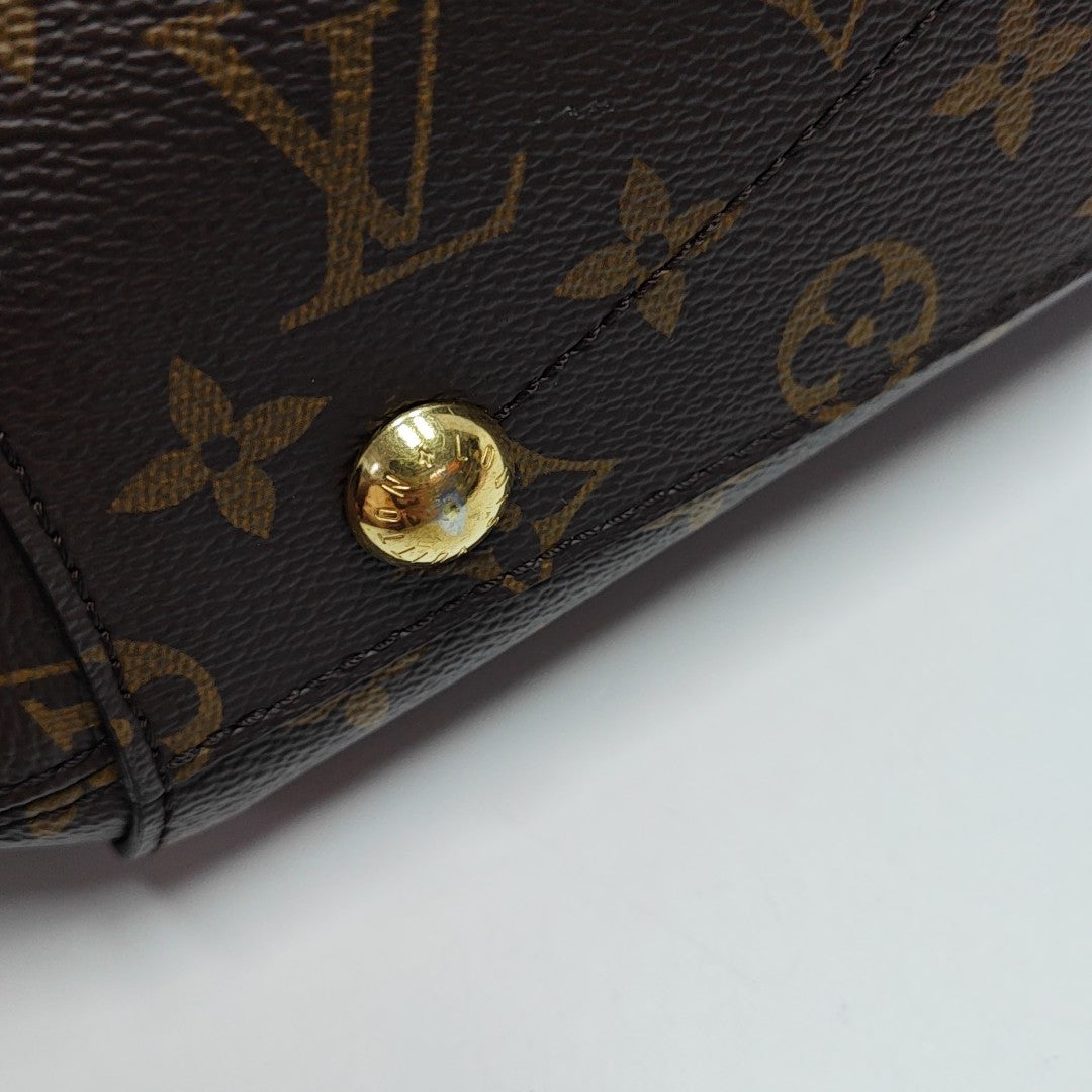 MONTAIGNE Monogram Coated Canvas Brown