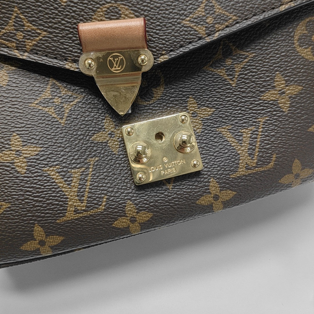 MÉTIS EAST WEST Monogram Coated Canvas Brown