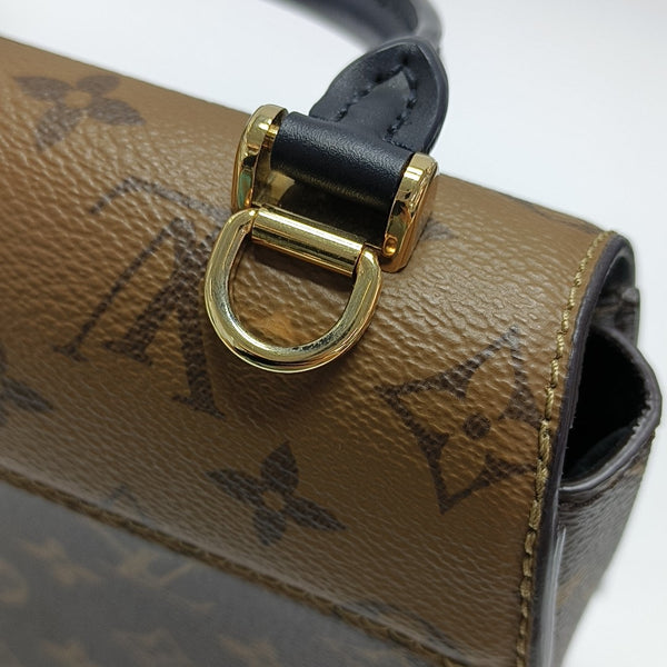 EDEN Monogram Coated Canvas Brown