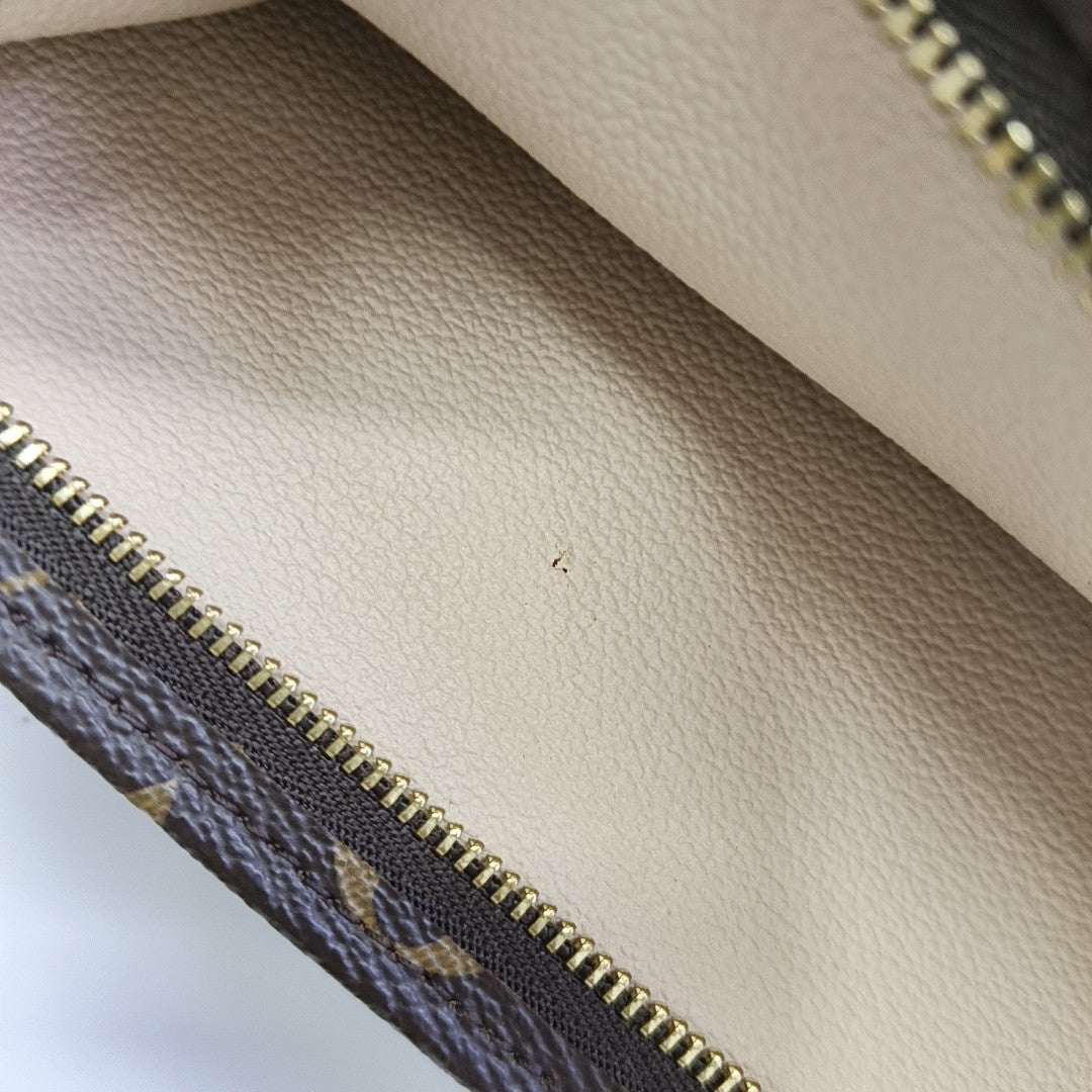 TOILET POCKET 26 Monogram Coated Canvas Brown