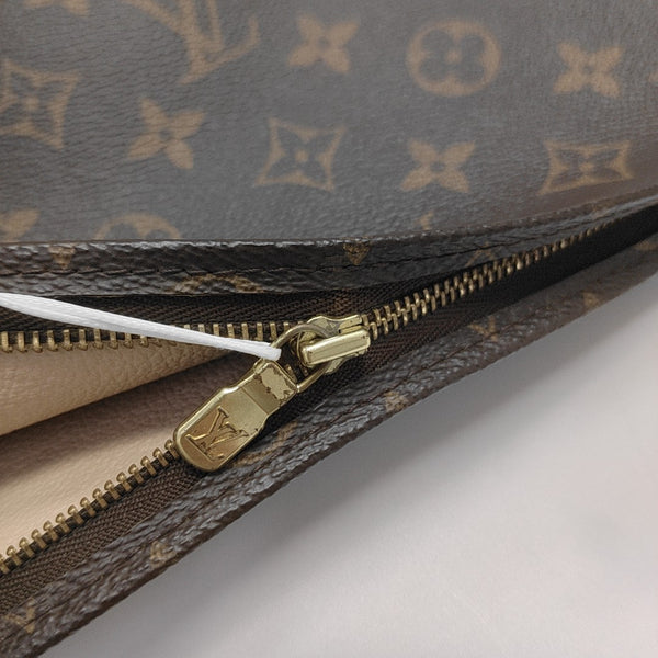TOILET POCKET 26 Monogram Coated Canvas Brown