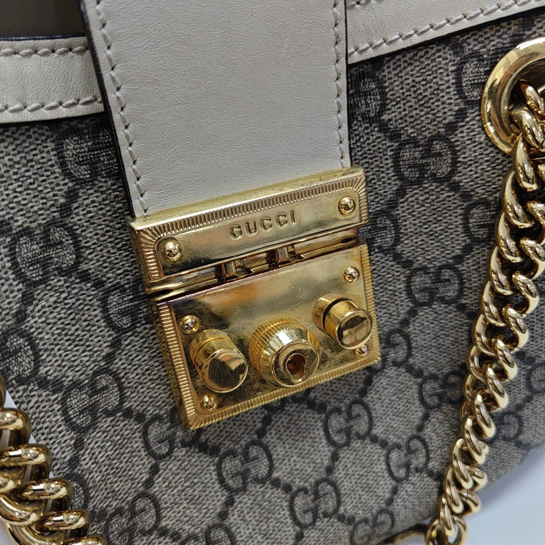 Padlock Small Monogram Coated Canvas Beige