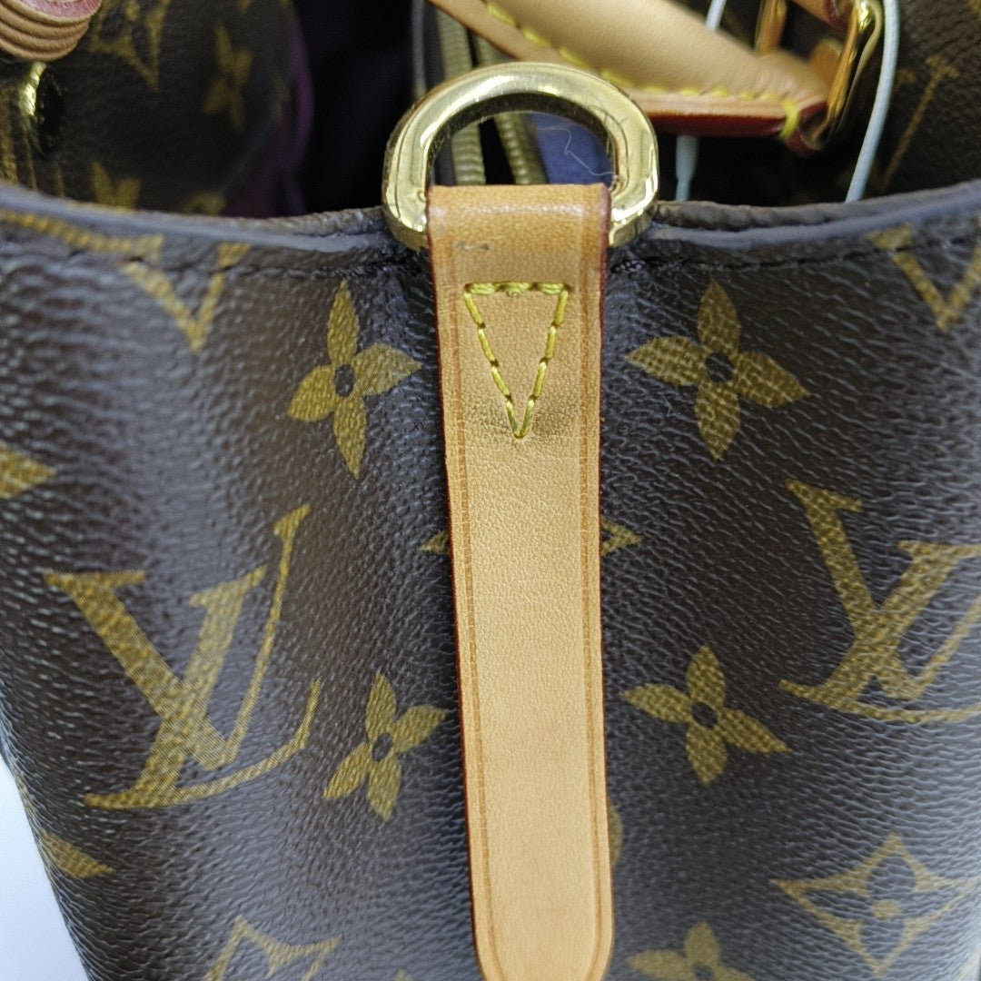 MONTAIGNE Monogram Coated Canvas Brown