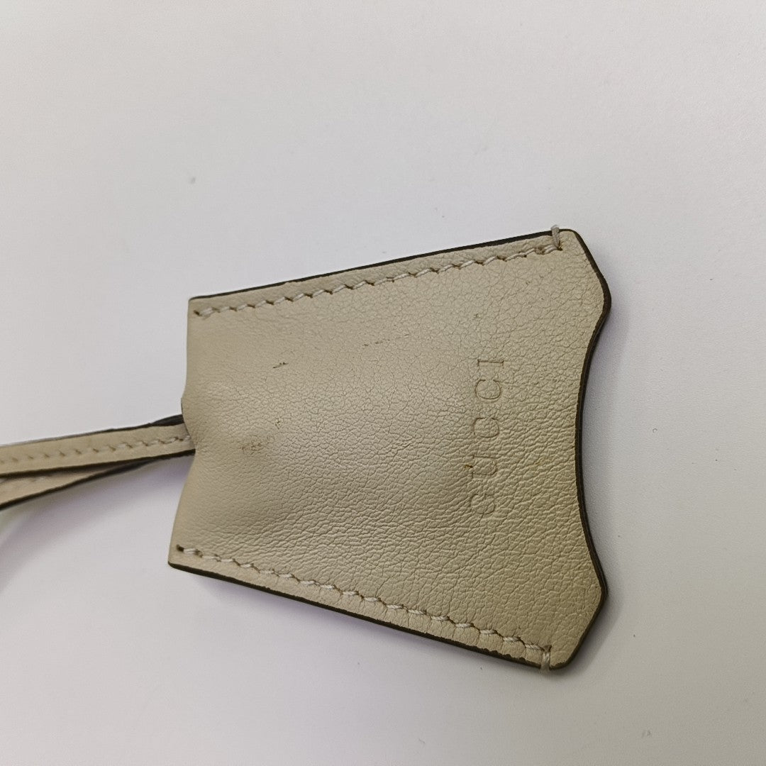 Padlock Small Monogram Coated Canvas Beige