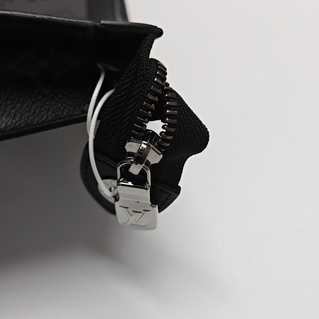 Pochette Voyag MM Monogram Coated Canvas Gray
