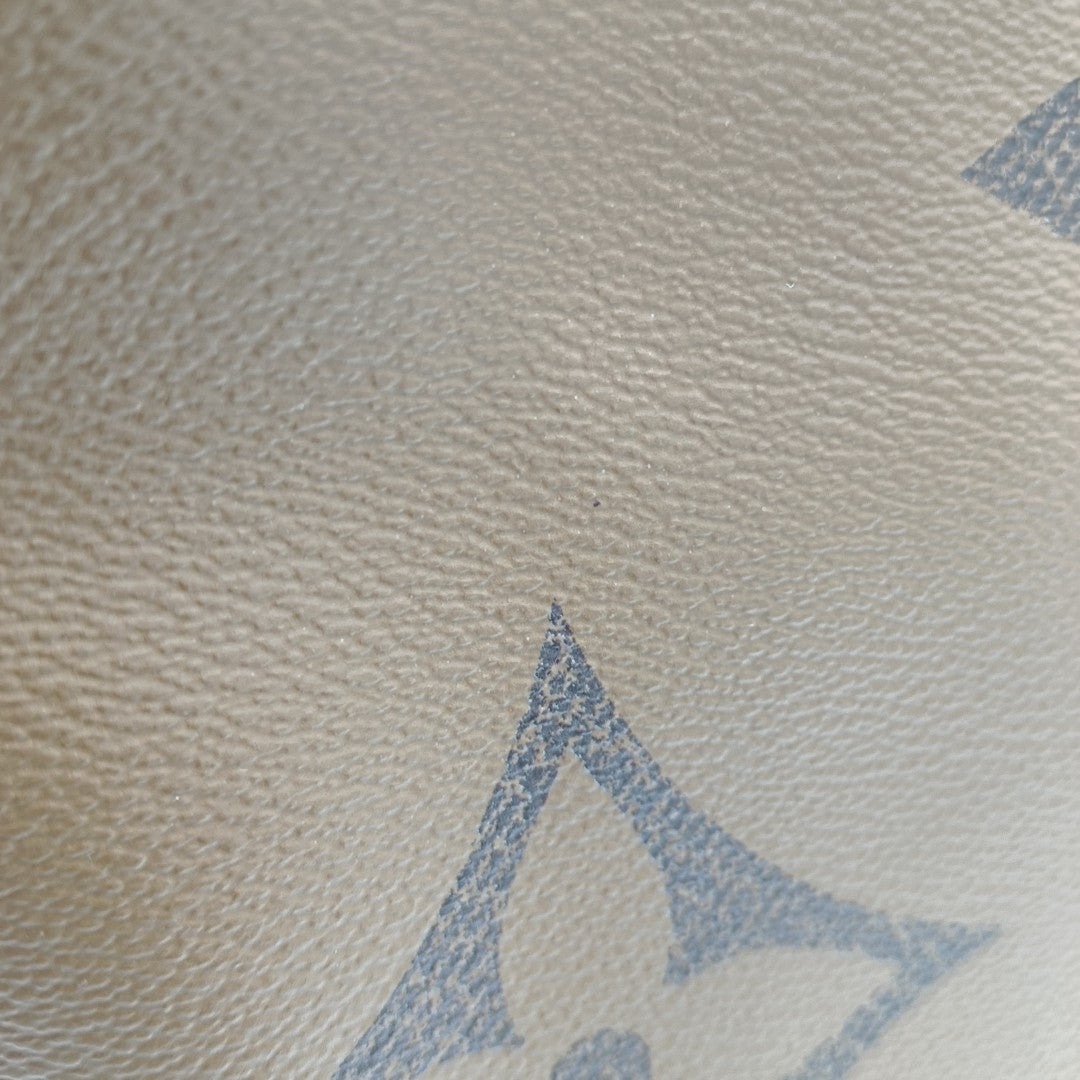 ONTHEGO GM Monogram Coated Canvas Brown