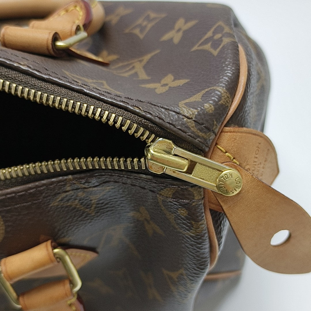 SPEEDY 25 Monogram Coated Canvas Brown
