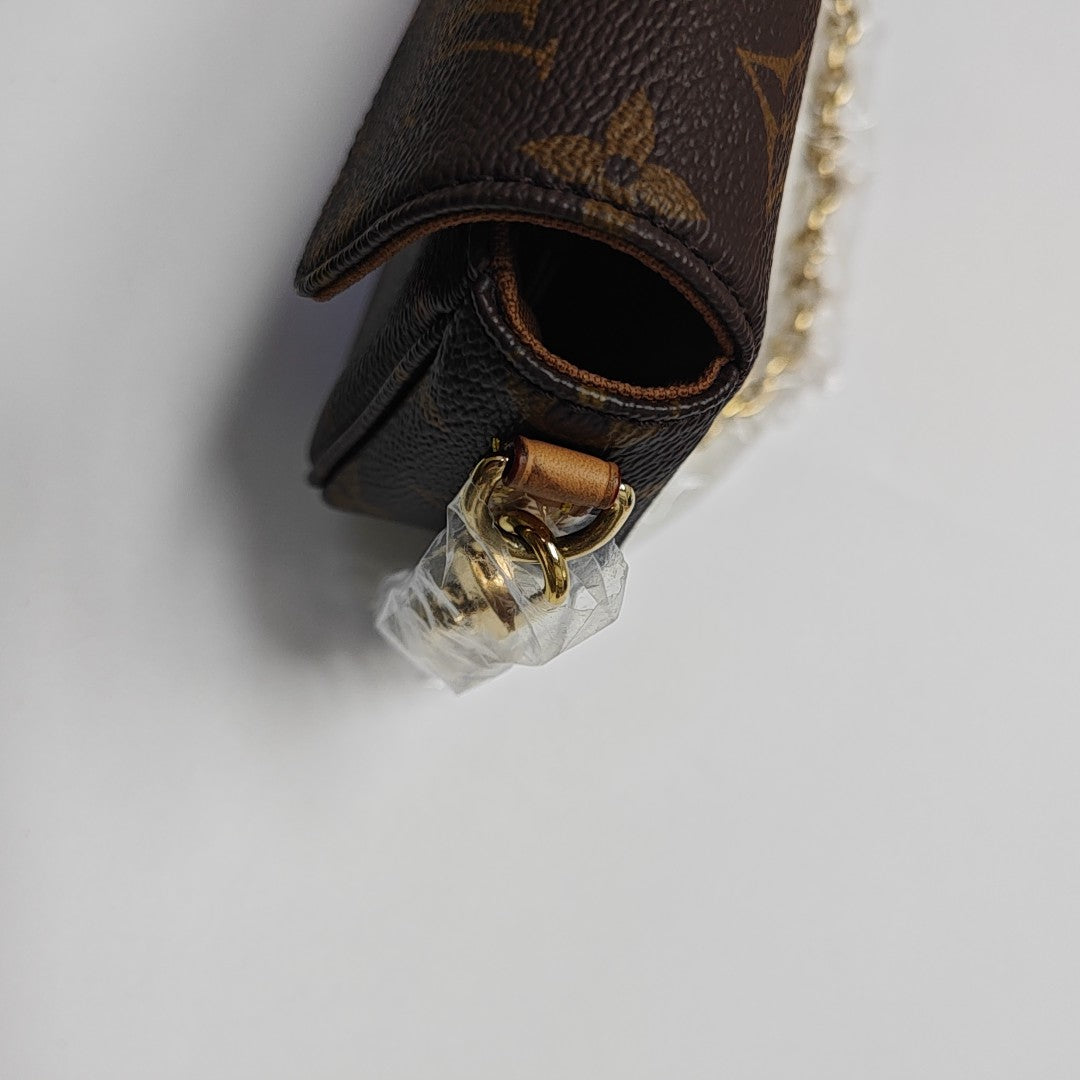 IVY Monogram Coated Canvas Brown