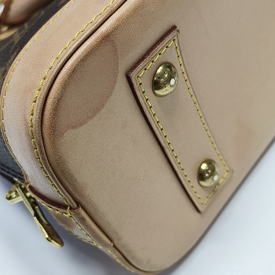 ALMA BB Monogram Coated Canvas Brown