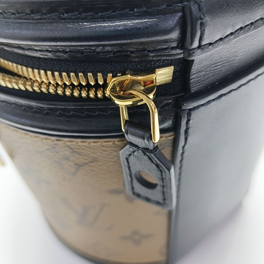 CANNES PM Monogram Coated Canvas Brown