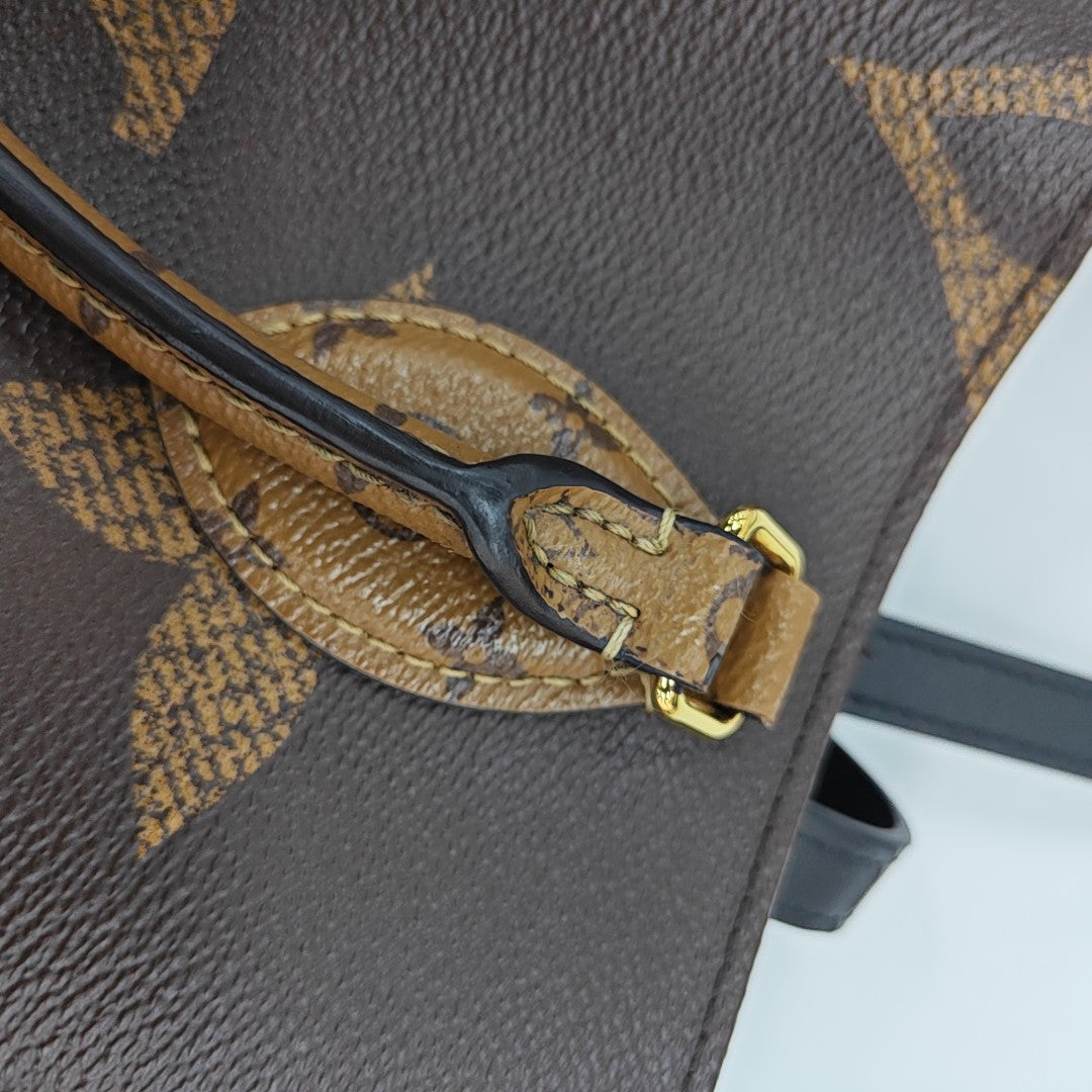 ONTHEGO MM Monogram Coated Canvas Brown
