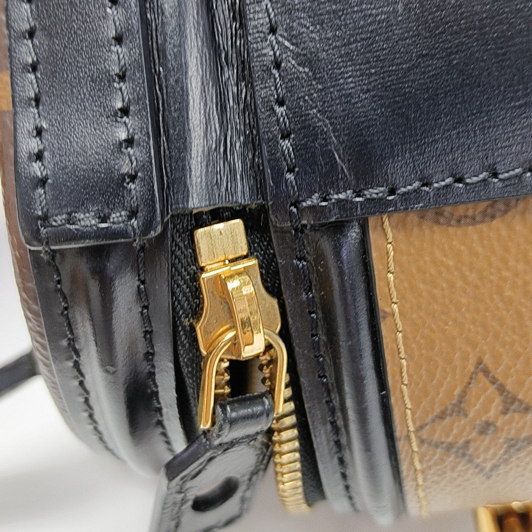 CANNES PM Monogram Coated Canvas Brown