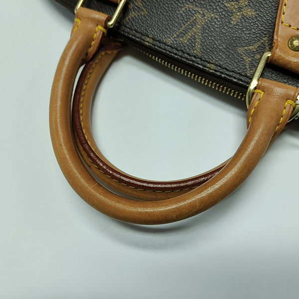 ALMA PM Monogram Coated Canvas Brown