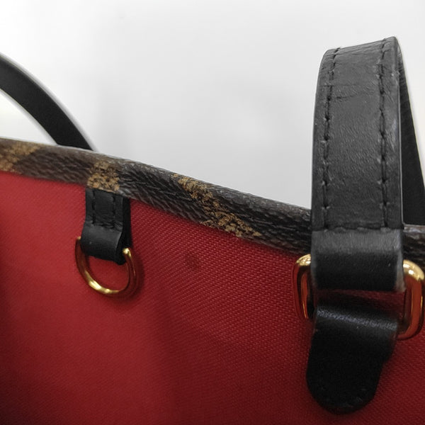 ONTHEGO MM Monogram Coated Canvas Brown