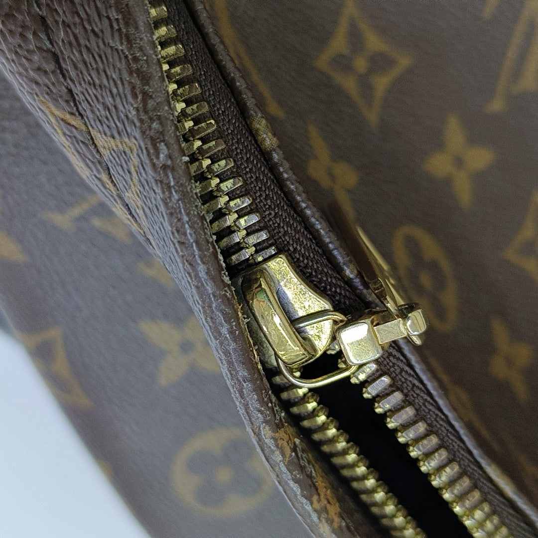 Monogram Coated Canvas Backpack Brown