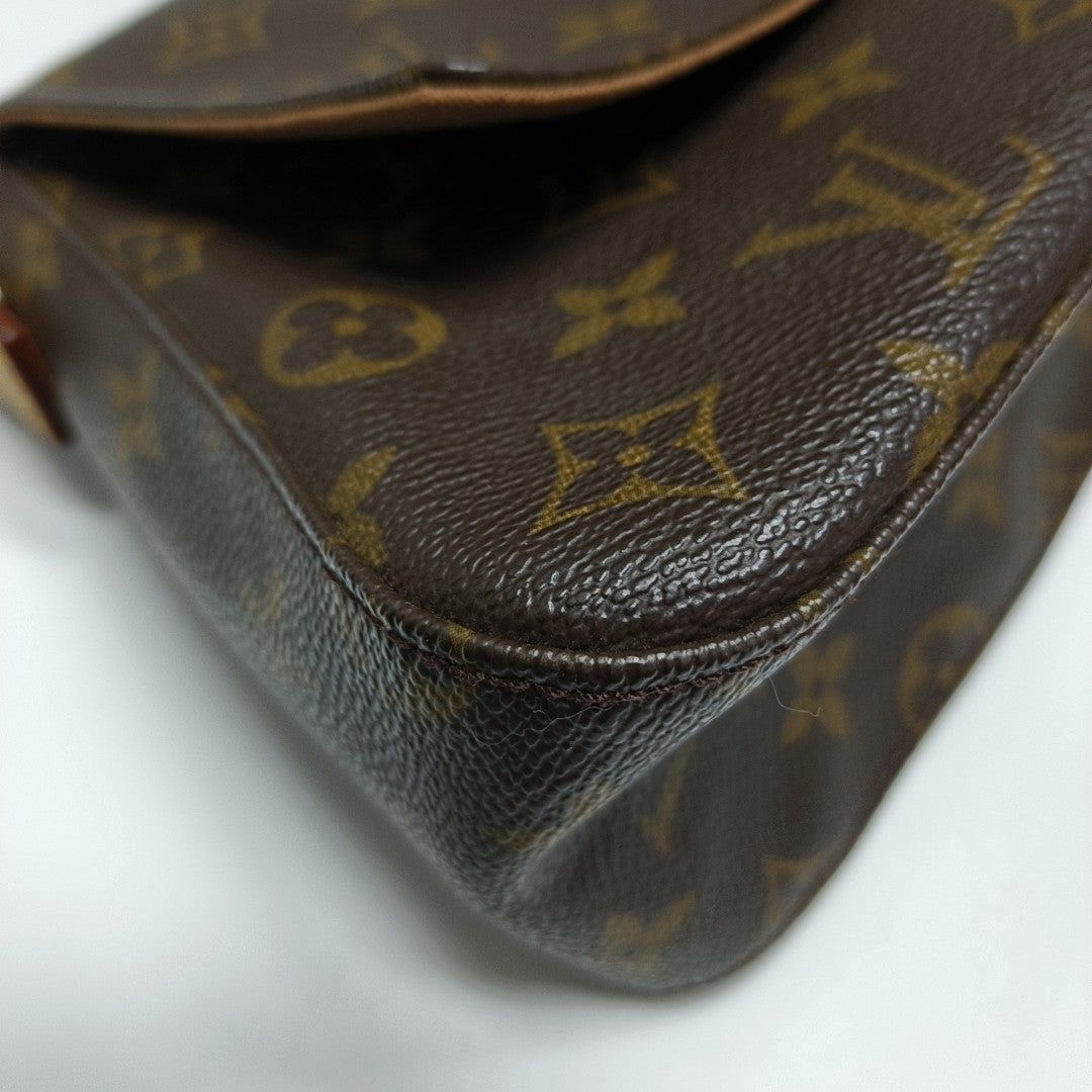 LOOPING PM Monogram Coated Canvas Brown