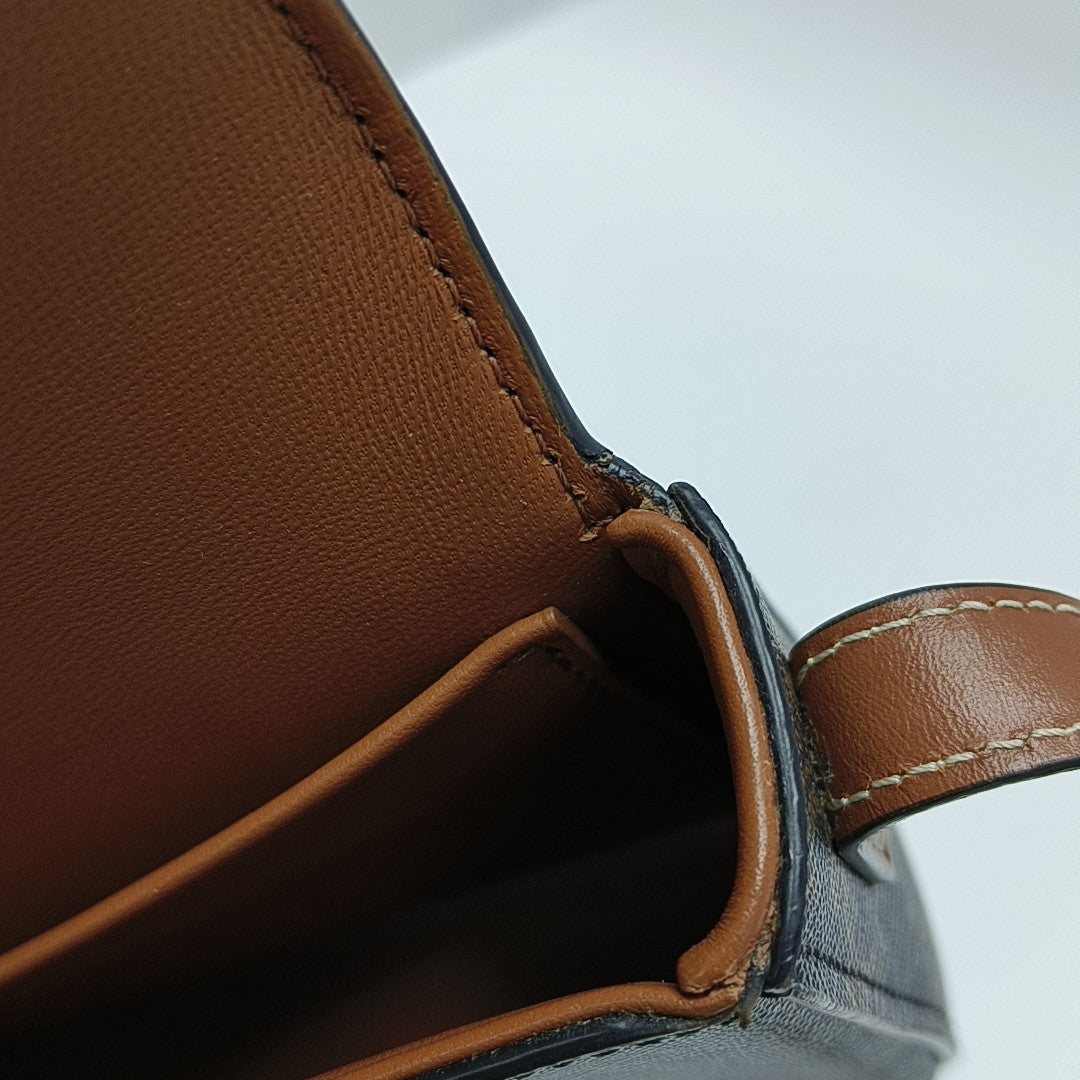 TRIOMPHE Small Coated Canvas Brown