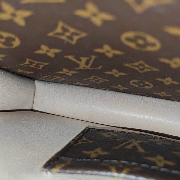 TRUNK Monogram Coated Canvas Brown