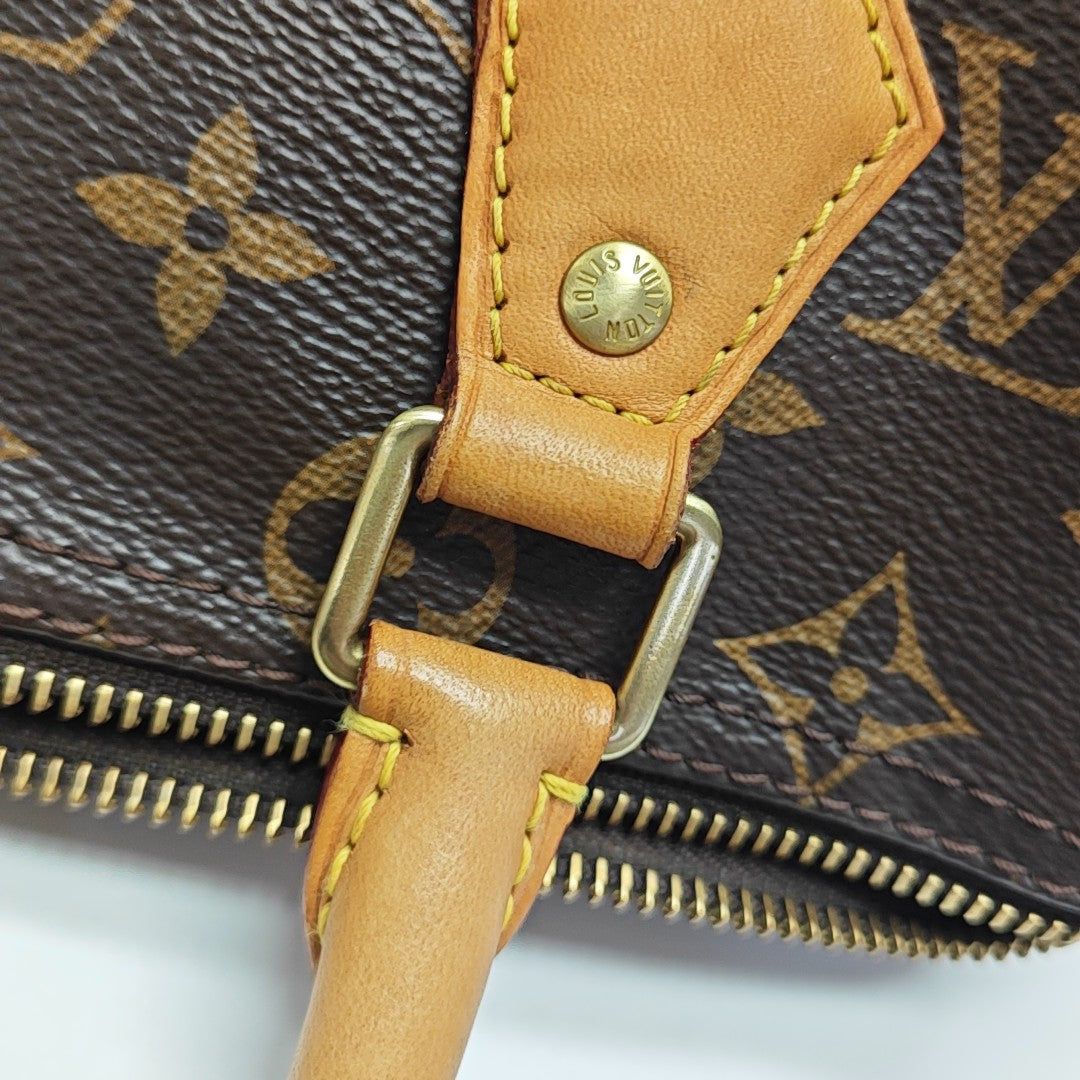 SPEEDY 25 Monogram Coated Canvas Brown