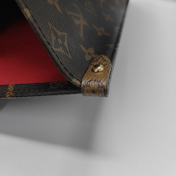 ONTHEGO MM Monogram Coated Canvas Brown
