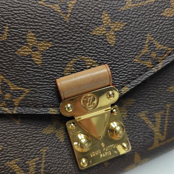 MÉTIS EAST WEST Monogram Coated Canvas Brown