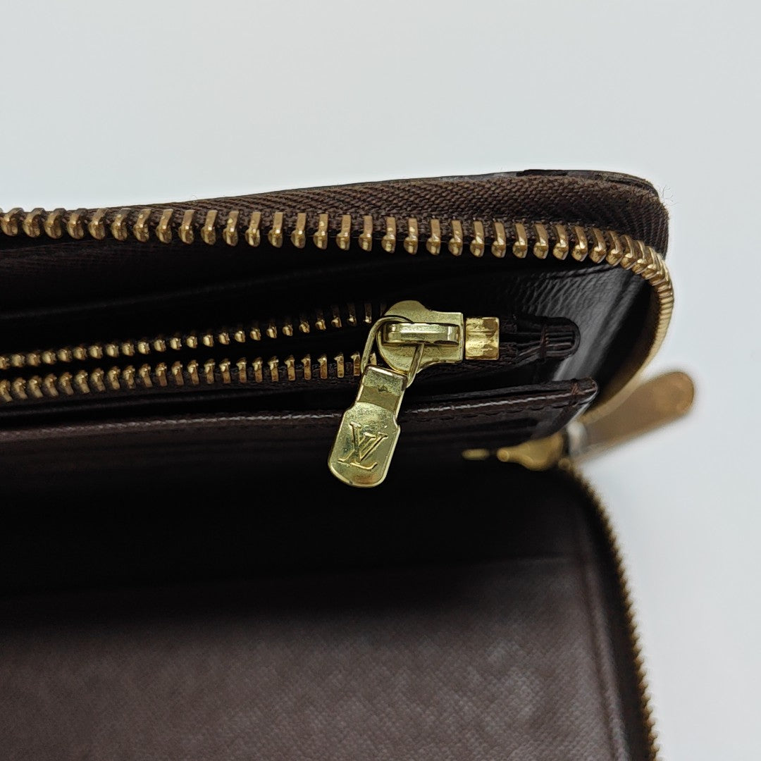 ZIPPY Damier Ebene Coated Canvas Brown Wallet