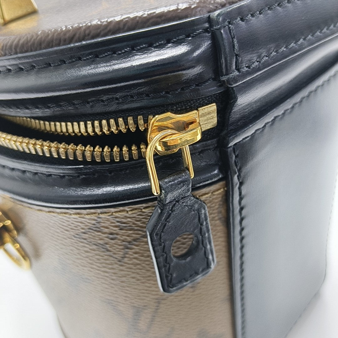 CANNES PM Monogram Coated Canvas Brown