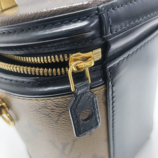 CANNES PM Monogram Coated Canvas Brown