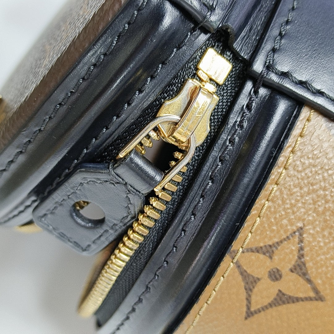 CANNES PM Monogram Coated Canvas Brown