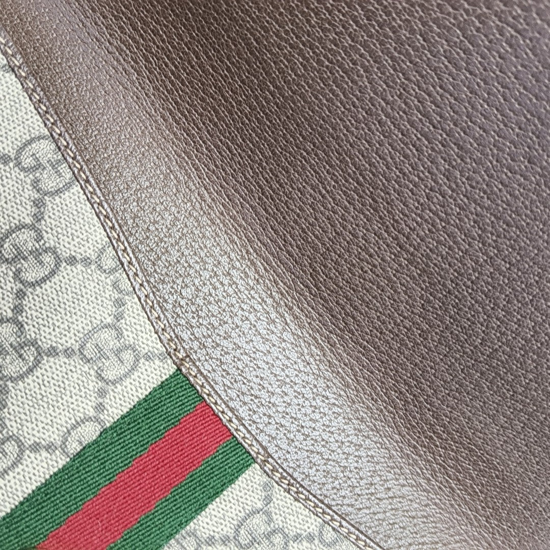 Monogram Coated Canvas Clutch Beige