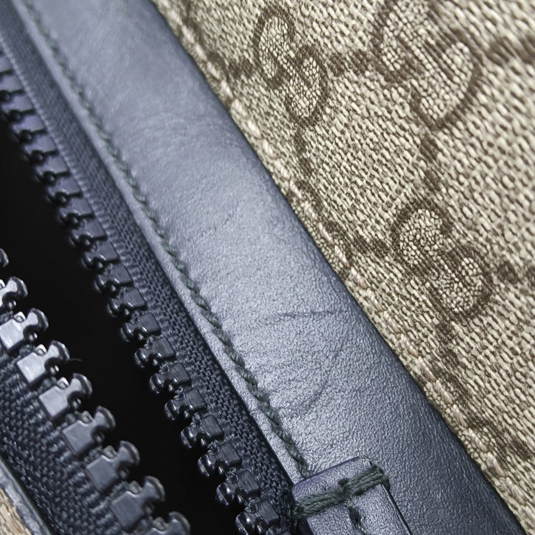 Monogram Coated Canvas Backpack Black