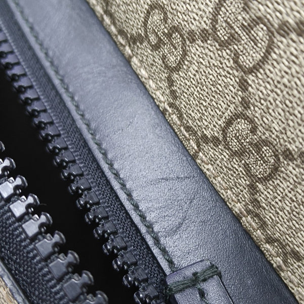Monogram Coated Canvas Backpack Black