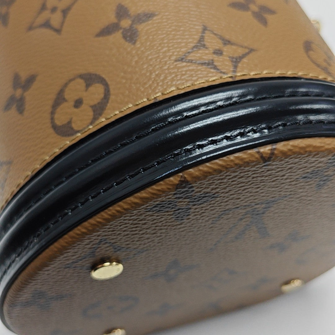 CANNES PM Monogram Coated Canvas Brown