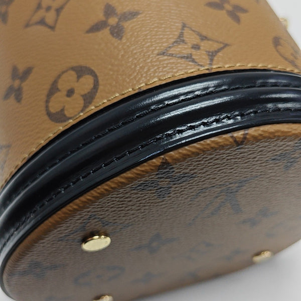 CANNES PM Monogram Coated Canvas Brown
