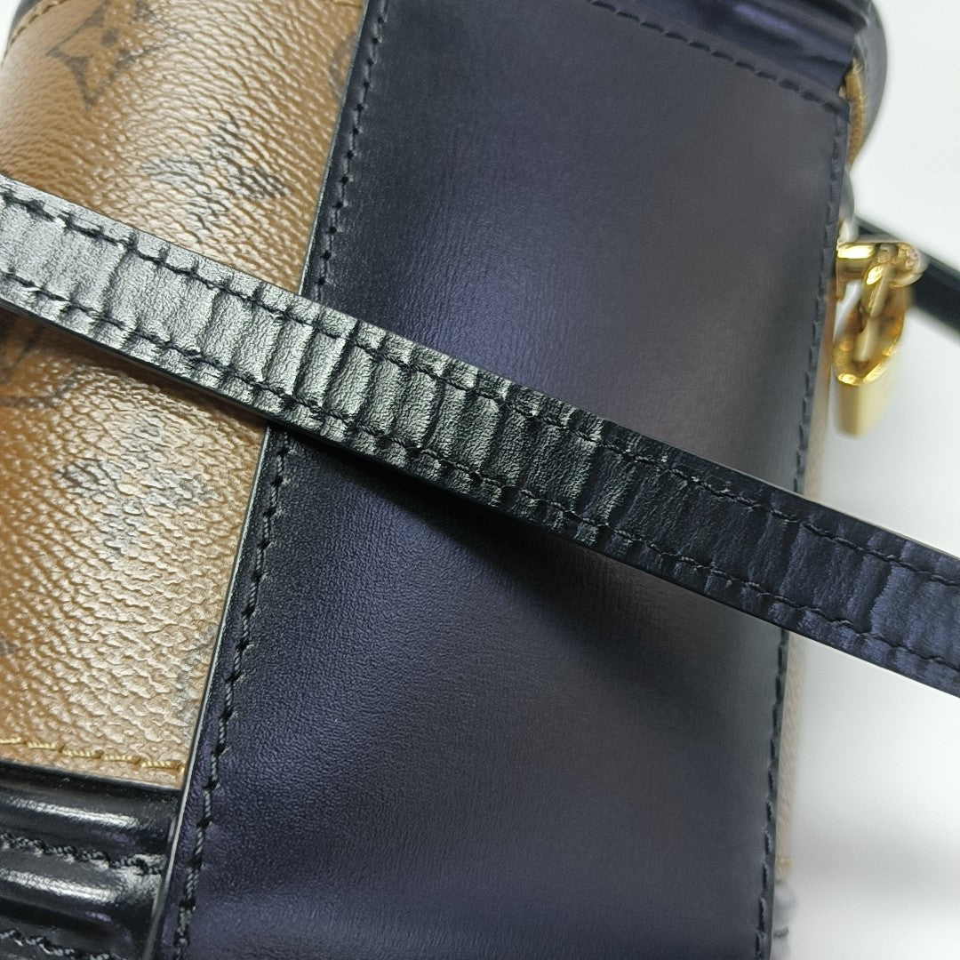 CANNES PM Monogram Coated Canvas Brown
