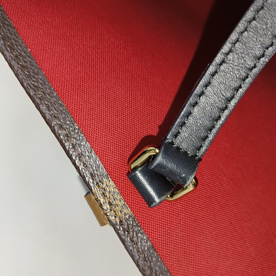 ONTHEGO GM Monogram Coated Canvas Brown