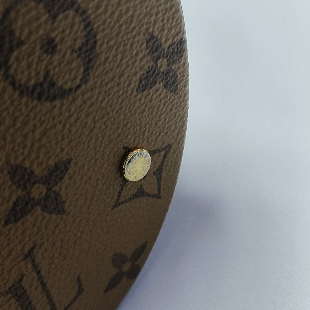 CANNES PM Monogram Coated Canvas Brown