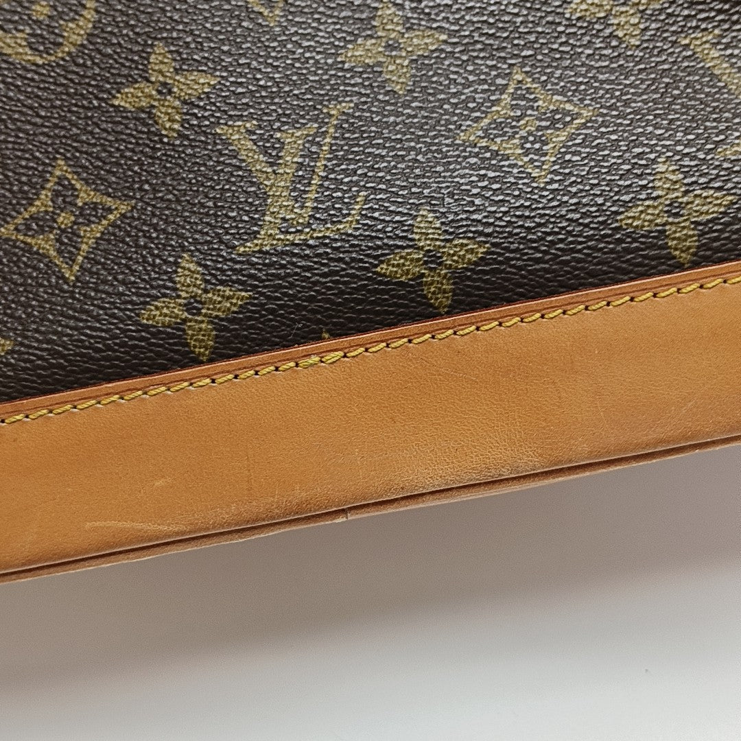 ALMA PM Monogram Coated Canvas Brown