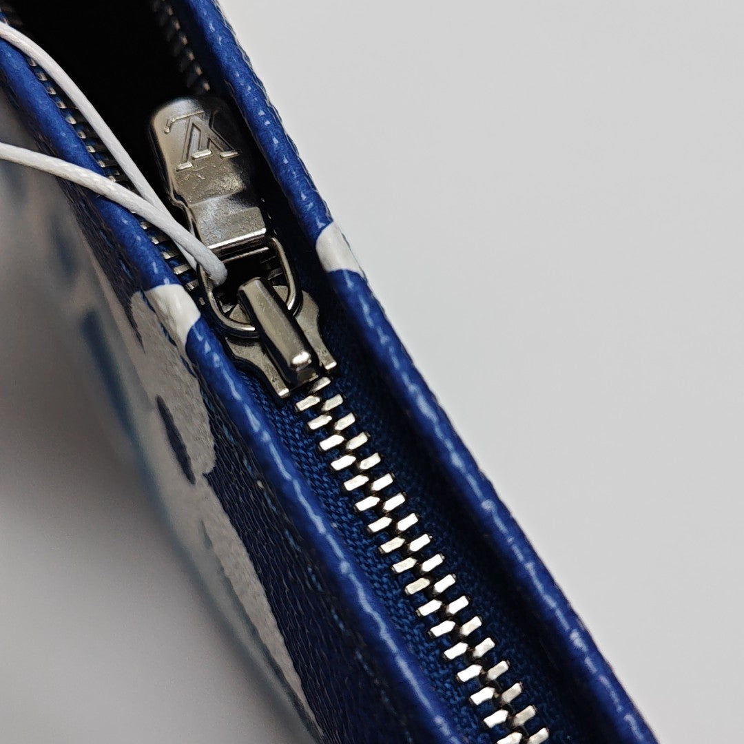 TOILET POCKET 26 Monogram Coated Canvas Blue