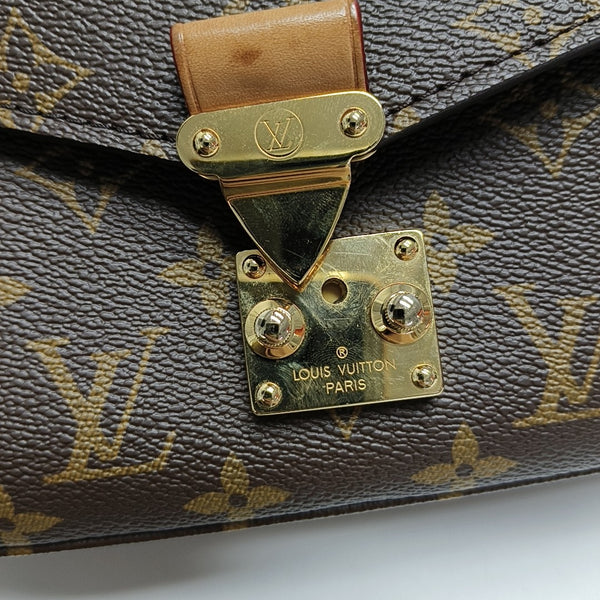 MÉTIS EAST WEST Monogram Coated Canvas Brown
