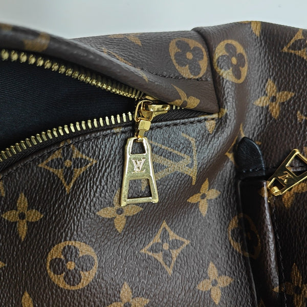 Monogram Coated Canvas Backpack Brown