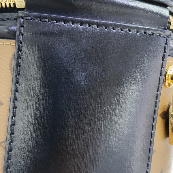 CANNES PM Monogram Coated Canvas Brown