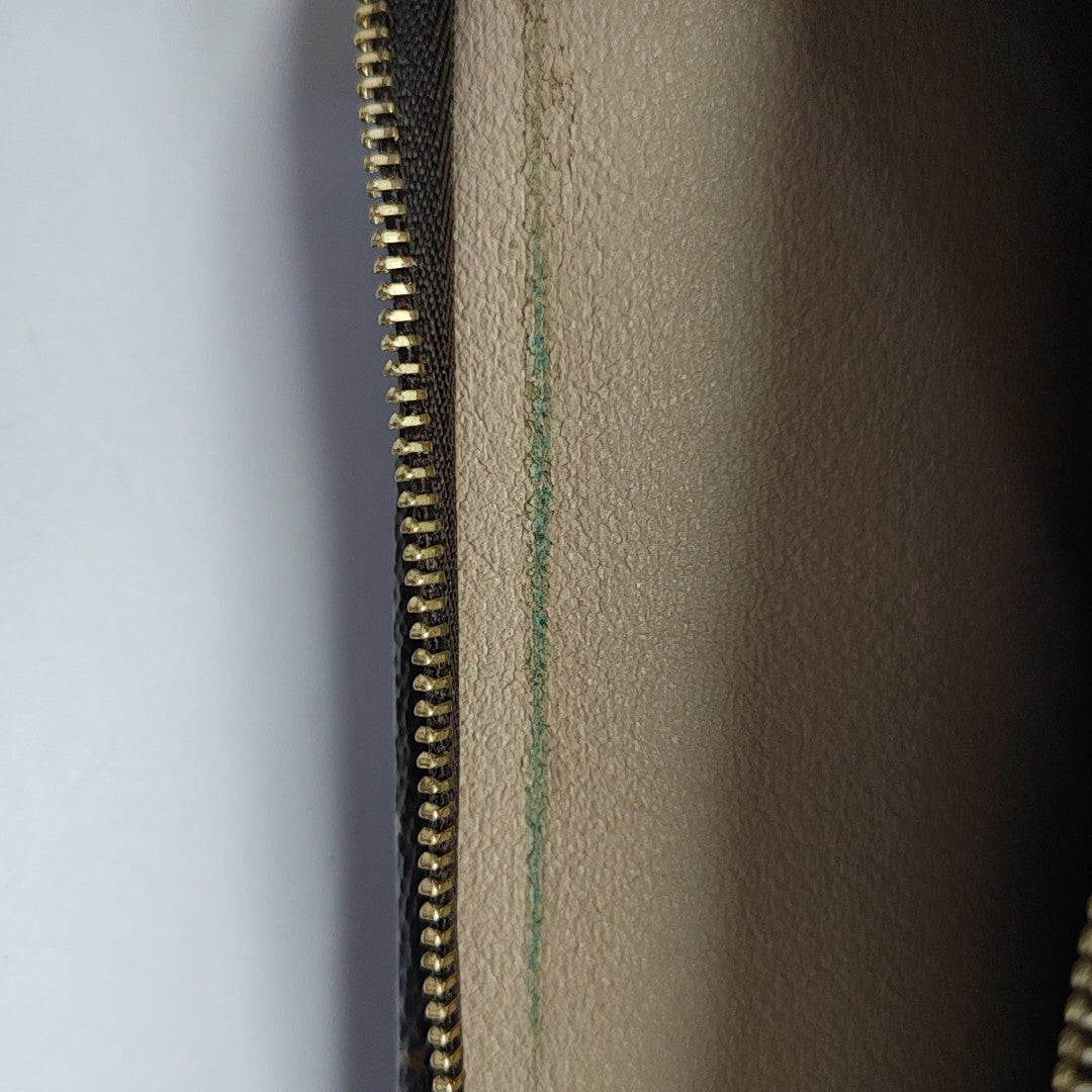 TOILET POCKET 26 Monogram Coated Canvas Brown