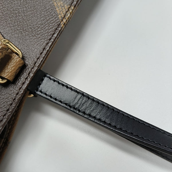 ONTHEGO MM Monogram Coated Canvas Brown