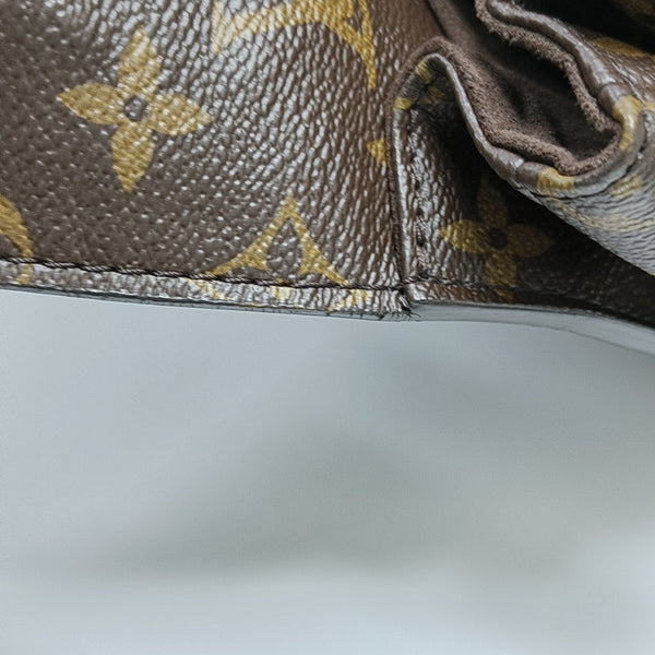 MÉTIS MM Monogram Coated Canvas Brown