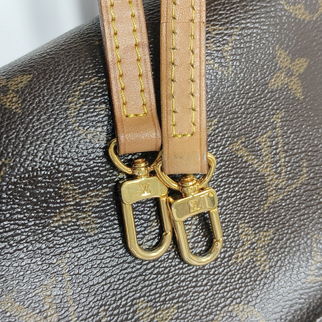 EVA Monogram Coated Canvas Brown