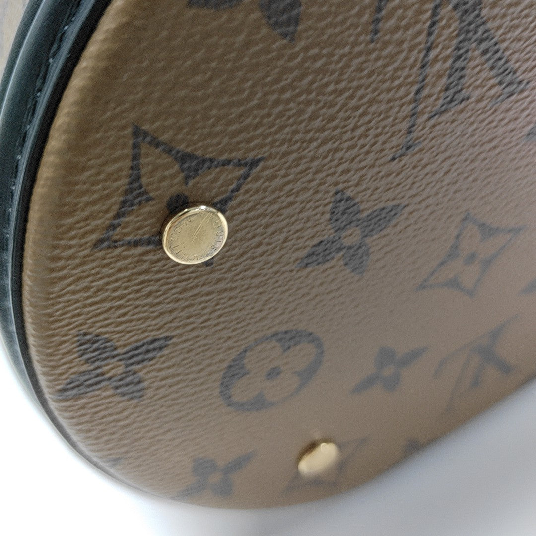 CANNES PM Monogram Coated Canvas Brown