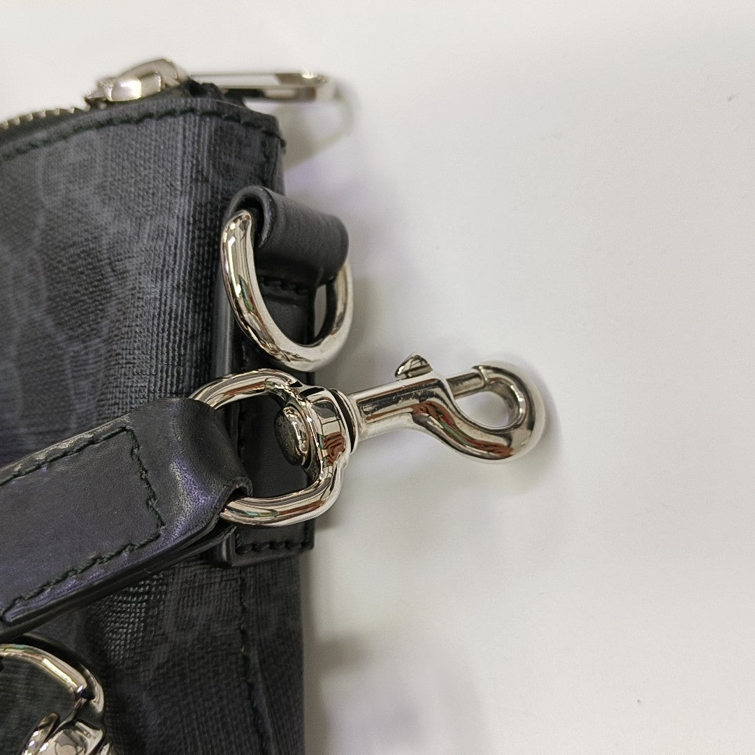 Rania Monogram Coated Canvas Black